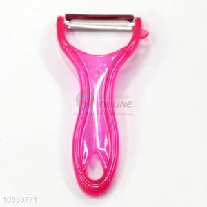 Clear pink stainless steel/plastic vegetable fruit peeler