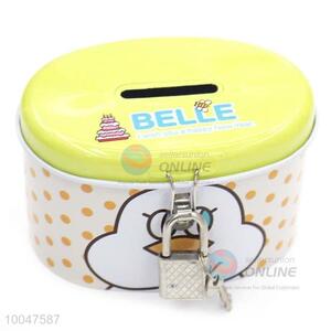 Cute yellow tinplate money box with lock