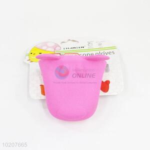 Pink non-stick silicone gloves for cooking