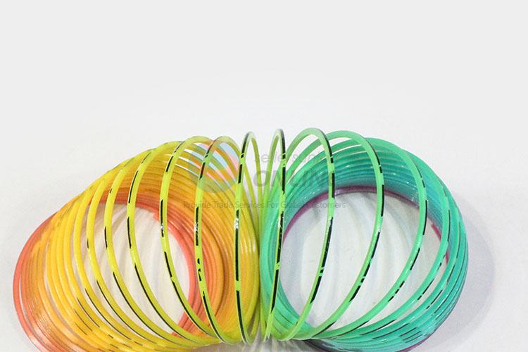 China Wholesale 12pcs Magic Rainbow Coil Spring Slinky Colorful Novelties Educational Toy