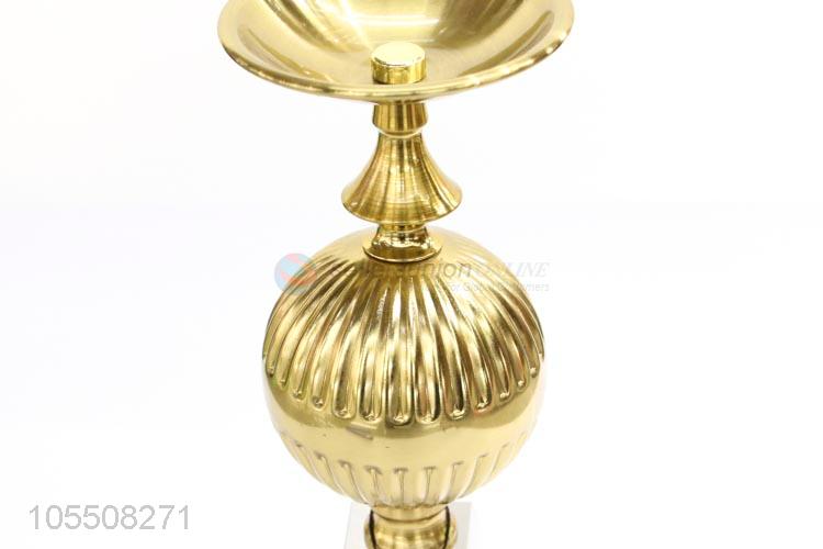 Customized golden iron candlestick with clear crystal base