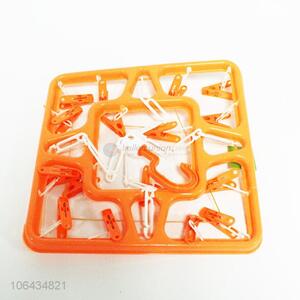 Wholesale household foldable plastic clothes hanger with 16 pegs