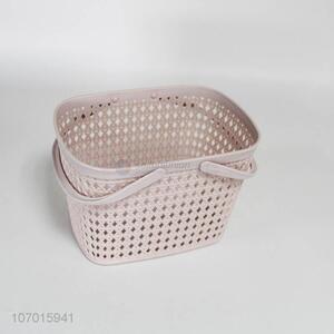 High quality hollowed out plastic storage basket with handle