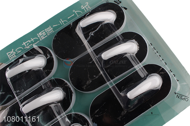 Factory direct sale black simple household storage sticky hook set