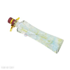 China wholesale creative glass crafts glass bottle with fake flower