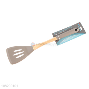 Yiwu market wooden handle slotted spatula for cooking