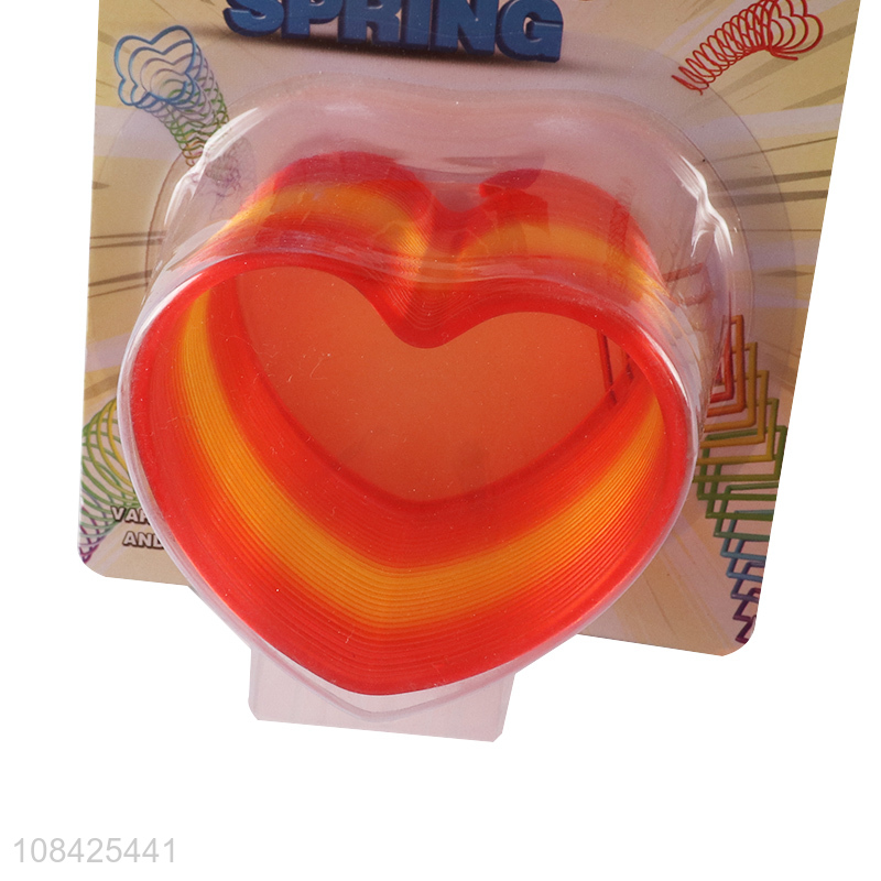 New design magic heart shape plastic rainbow spring for kids adults