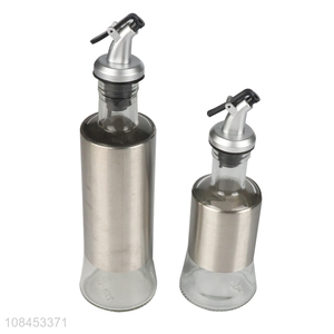 Factory supply glass oilve oil vinegar sauce bottle with stainless steel coating