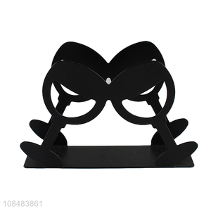 Good quality black <em>cup</em> type napkin holder for restaurant