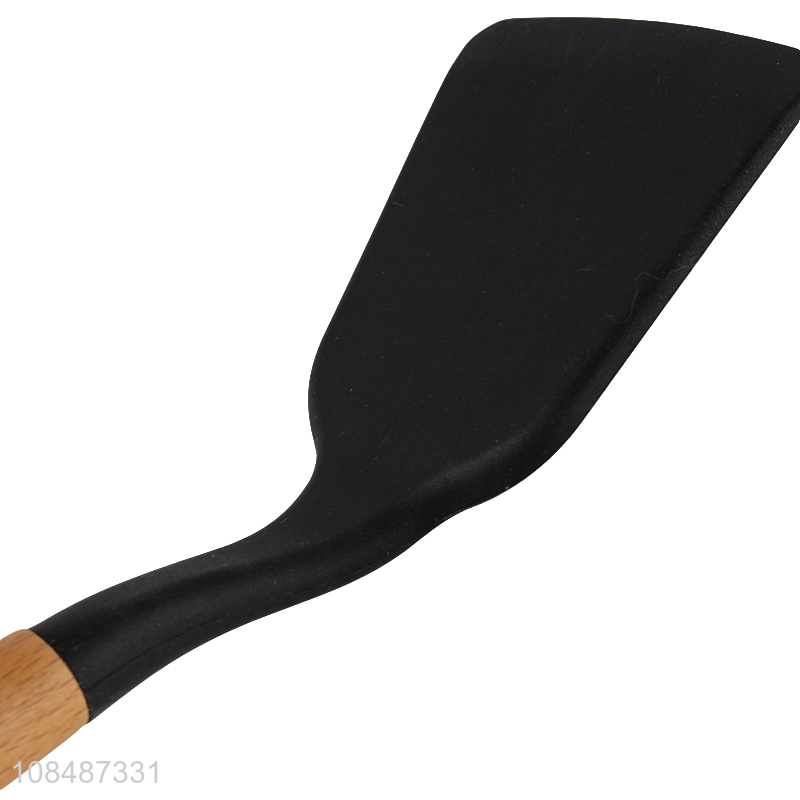 Good quality non-stick heat reistant silicone cooking spatula with wooden handle