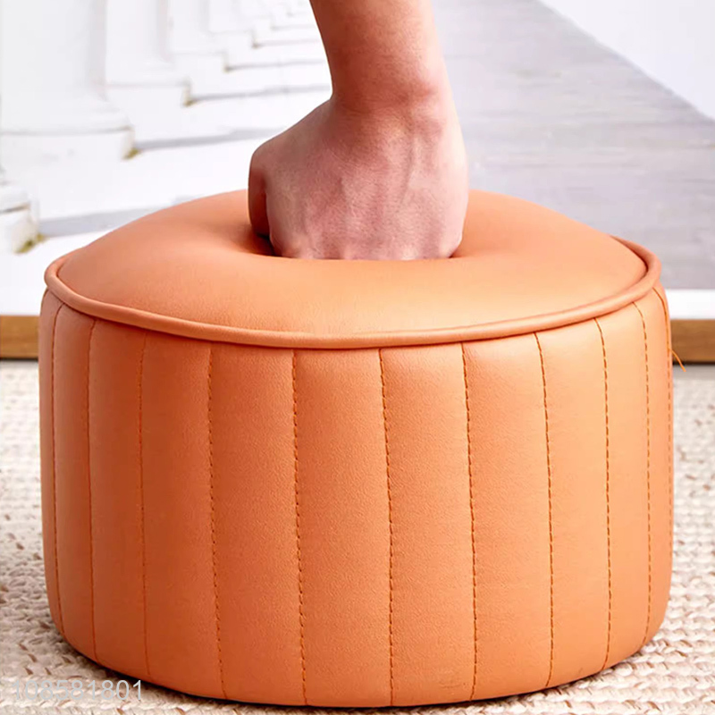 Good quality small round shoe changing stool upholstered footstool