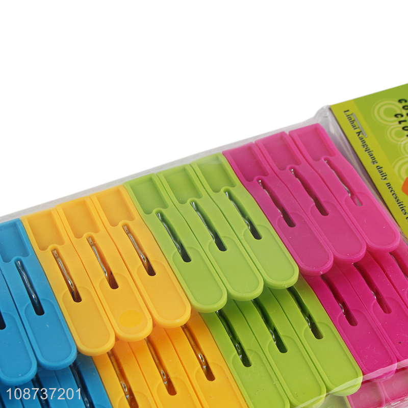 Hot product 24pcs windproof plastic clothes pegs with springs