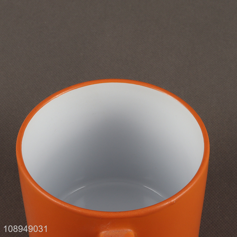 Low price orange ceramic water cup coffee cup with handle