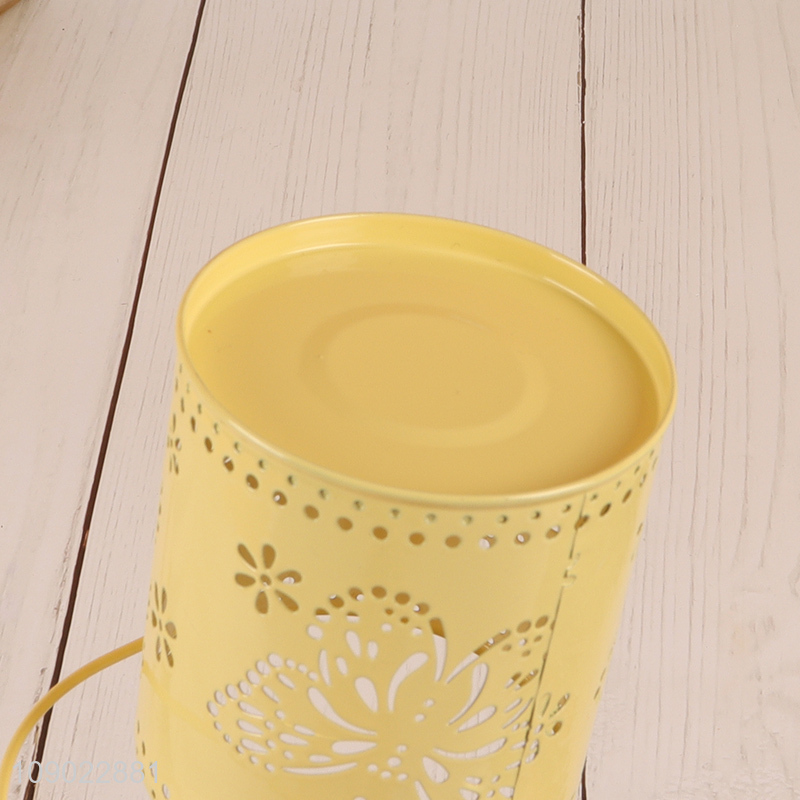 Best price yellow hanging hollow metal candle holder for home decoration