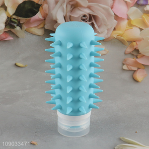 Yiwu market portable travel silicone squeeze bottle shampoo bottle with brush