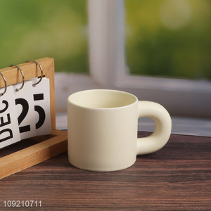 Yiwu market white <em>ceramic</em> 320ml water <em>cup</em> coffee <em>cup</em> with handle